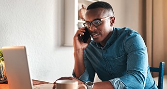 man speaking through mobile